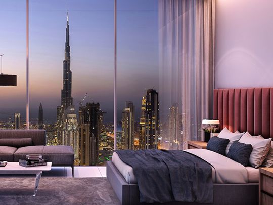 Luxurious bedroom with a panoramic view of the Dubai skyline and Burj Khalifa in prime real estate Dubai