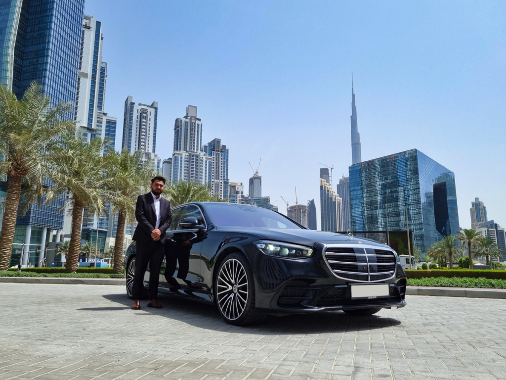 Luxurious private transfer service with a high-end sedan in Dubai.