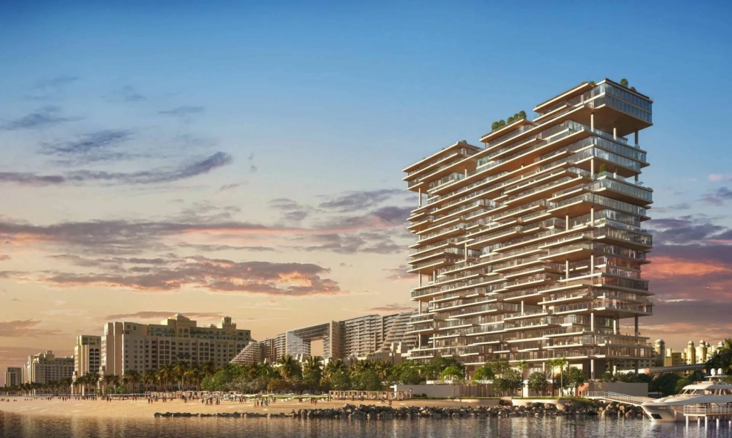 Luxurious waterfront residential building on Palm Jumeirah in Dubai during sunset.
